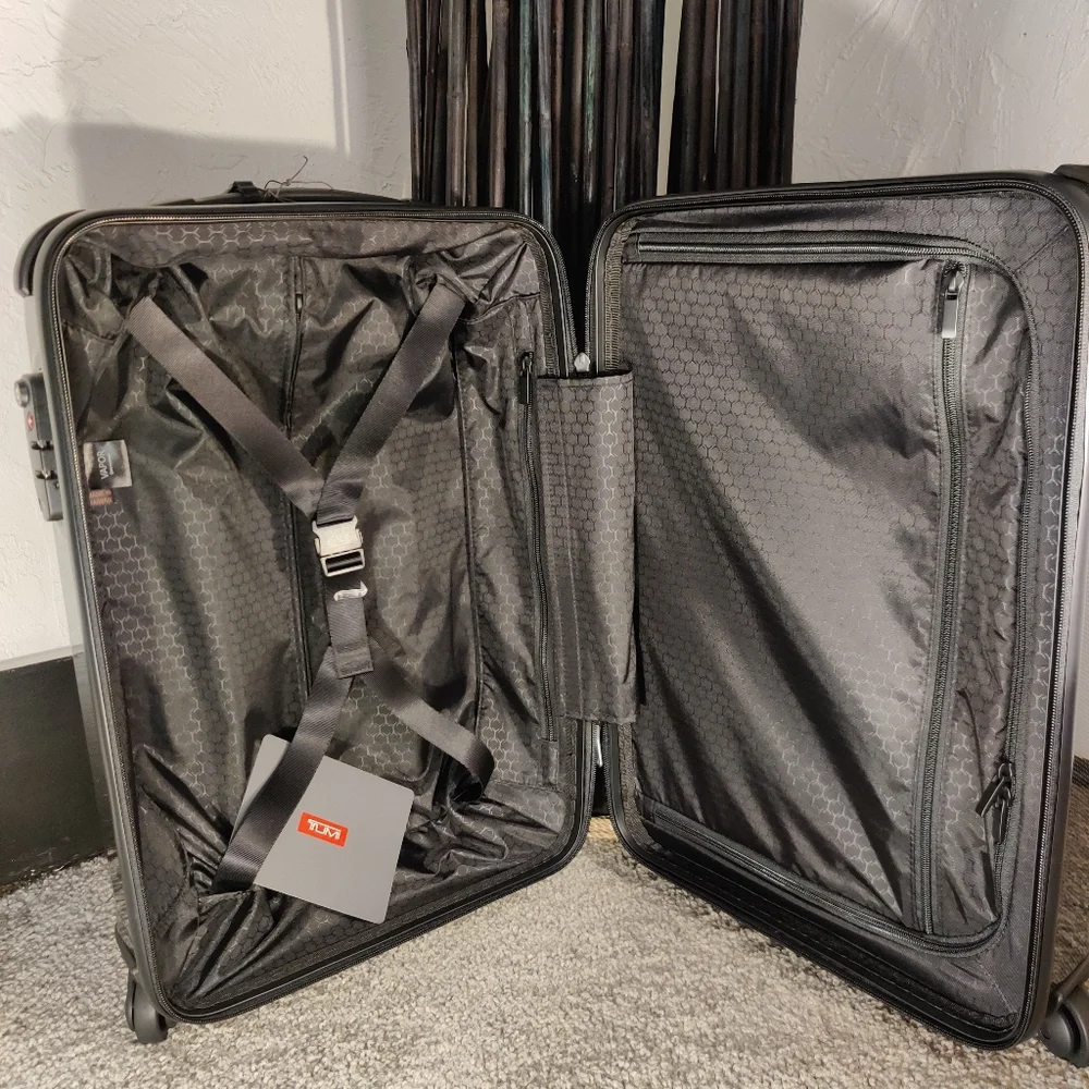 Tumi •upgrade your